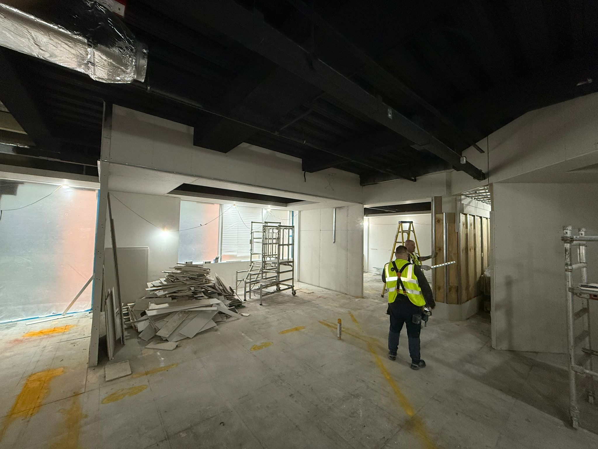 Glass partitions creating meeting spaces